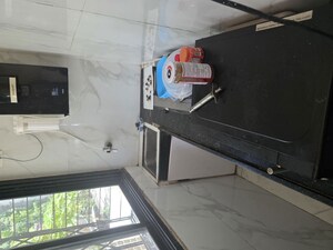 Kitchen in 2 BHK Apartment at Ram Janki Apartment, Vile Parle East – for Rent