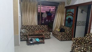 Living Room in 1 BHK Apartment at Grant Road – for Sale