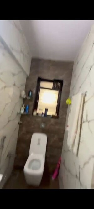 Bathroom in 2 BHK Apartment at Kalpataru Shravasti, Malad West – for Rent