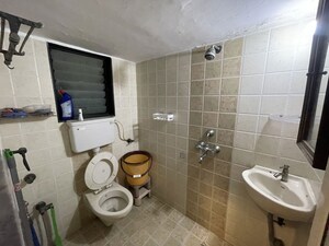 Bathroom in 2 BHK Apartment at Sea Shell Apartments, Andheri West – for Rent