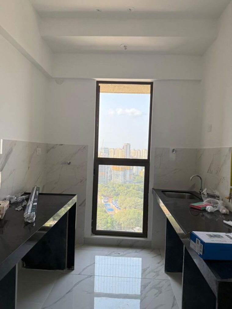 Kitchen, lodha-amara-tower-44 2 Bedroom 530 Sq.Ft. Apartment In Kolshet Road Thane 10438900