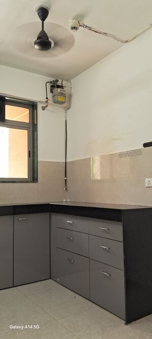 Kitchen in 1 BHK Apartment at Hiranandani Estate Villa Carino, Ghodbunder Road – for Rent