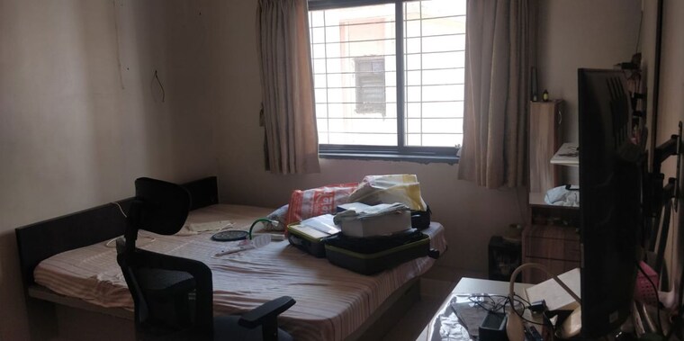 Living Room, mantri-avenue-1-chs 2 Bedroom 850 Sq.Ft. Apartment In Pashan Pune 10438971