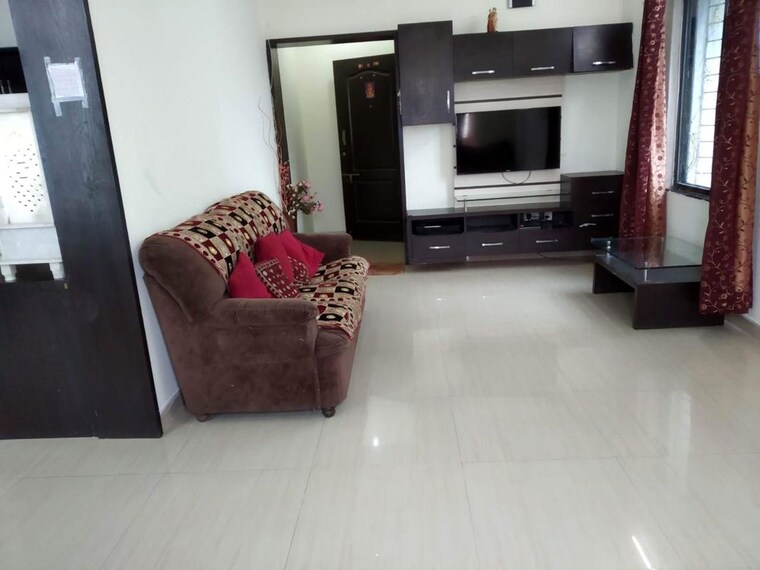 Living Room, kumar-padmalaya 2 Bedroom 850 Sq.Ft. Apartment In Aundh Pune 10439078