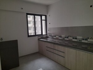 Kitchen in 2 BHK Apartment at Unique Youtopia, Kharadi – for Sale