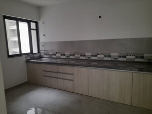 Kitchen in 2 BHK Apartment at Unique Youtopia, Kharadi – for Sale