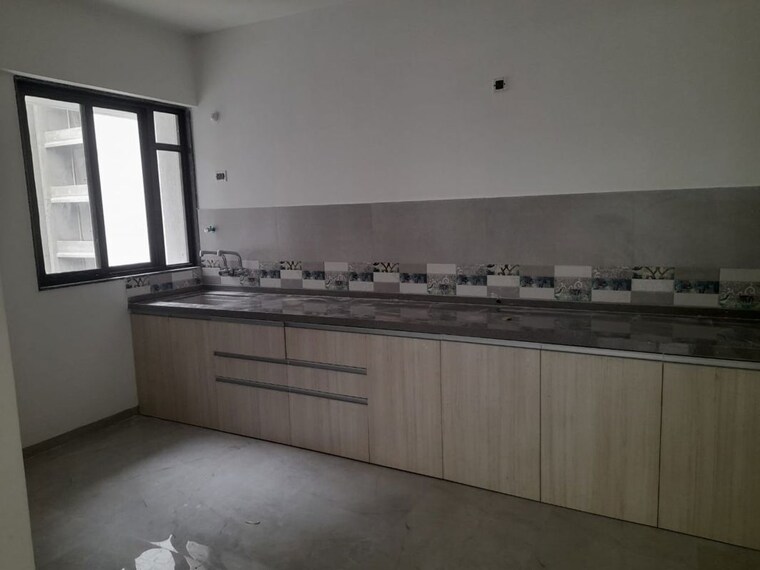 Kitchen, unique-youtopia 2 Bedroom 1200 Sq.Ft. Apartment In Kharadi Pune 10439014