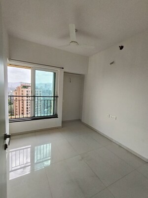 Room in 2 BHK Apartment at Rustomjee Urbania Azziano, Thane West – for Rent