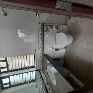 Attached Bathroom in 2 BHK Apartment at K Raheja Heights, Malad East – for Rent