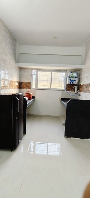 Kitchen in 1.5 BHK Apartment at Wadgaon Sheri – for Rent