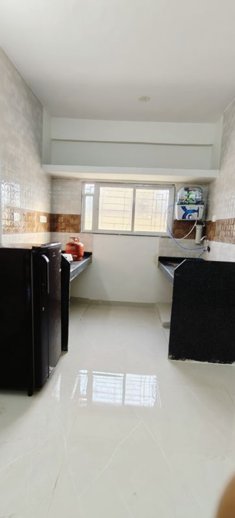Kitchen, wadgaon sheri 1.5 Bedroom 800 Sq.Ft. Apartment In Wadgaon Sheri Pune 10439241