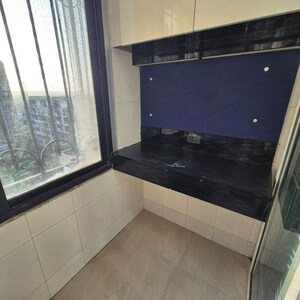 Living Room in 1 BHK Apartment at Romell Empress, Borivali West – for Rent