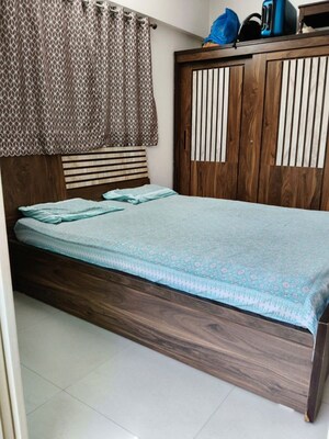 Bedroom in 2 BHK Apartment at Shreyas Palladium Grand, Dhanori – for Rent