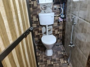 Bathroom in 1 BHK Apartment at API Vasudev Heights, Mira Road – for Rent