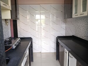 Kitchen in 1 BHK Apartment at API Vasudev Heights, Mira Road – for Rent