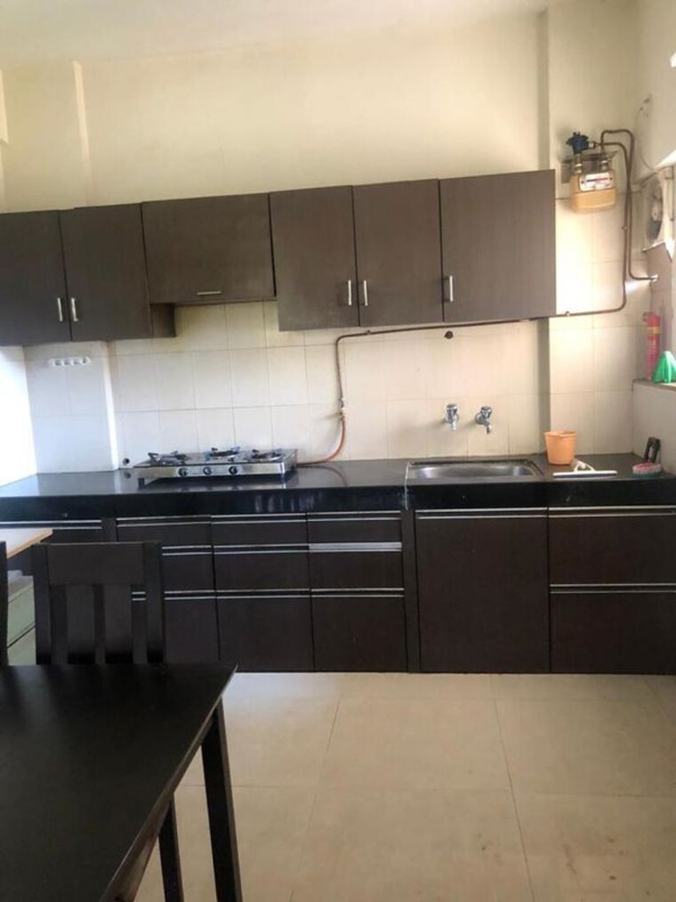 Kitchen, gera-parkview-i 2 Bedroom 870 Sq.Ft. Apartment In Kharadi Pune 10439542