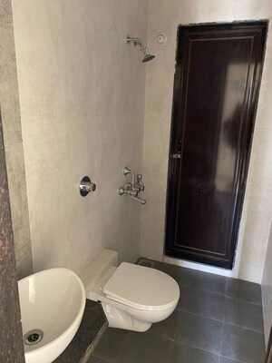 Bathroom in 1 BHK Apartment at Vihang Valley Rio, Kasarvadavali – for Rent