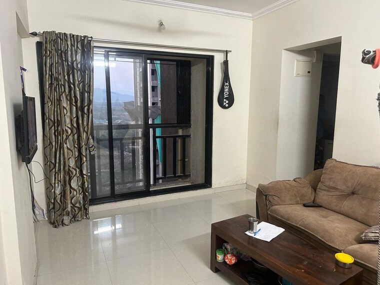 Living Room, raunak-unnathi-woods-phase-4-and-5 1 Bedroom 350 Sq.Ft. Apartment In Ghodbunder Road Thane 10439581