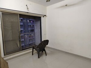 Living Room in 2 BHK Apartment at Poonam Estate Cluster I, Mira Road – for Sale