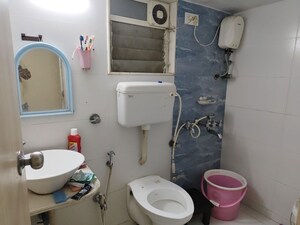 Bathroom in 2 BHK Apartment at Poonam Estate Cluster I, Mira Road – for Sale