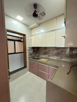 Kitchen in 1.5 BHK Apartment at Dosti West County, Balkum Pada – for Rent