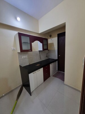 Kitchen in 1 BHK Apartment at VR Bhoomi Acres H wing, Waghbil – for Rent