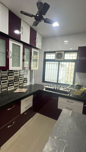 Kitchen in 2 BHK Apartment at Sudarshan Sky Garden, Ghodbunder Road – for Rent