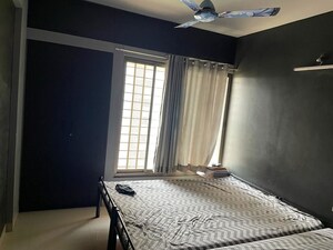 Bedroom in 2 BHK Apartment at Manjri Budruk – for Sale