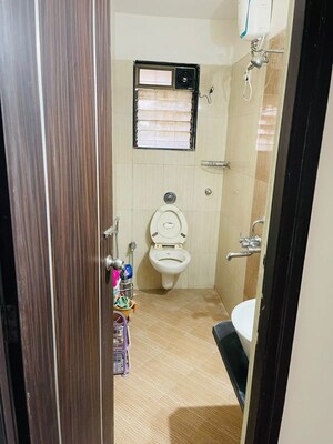 Bathroom in 1 BHK Apartment at Raunak Heights, Ghodbunder Road – for Rent