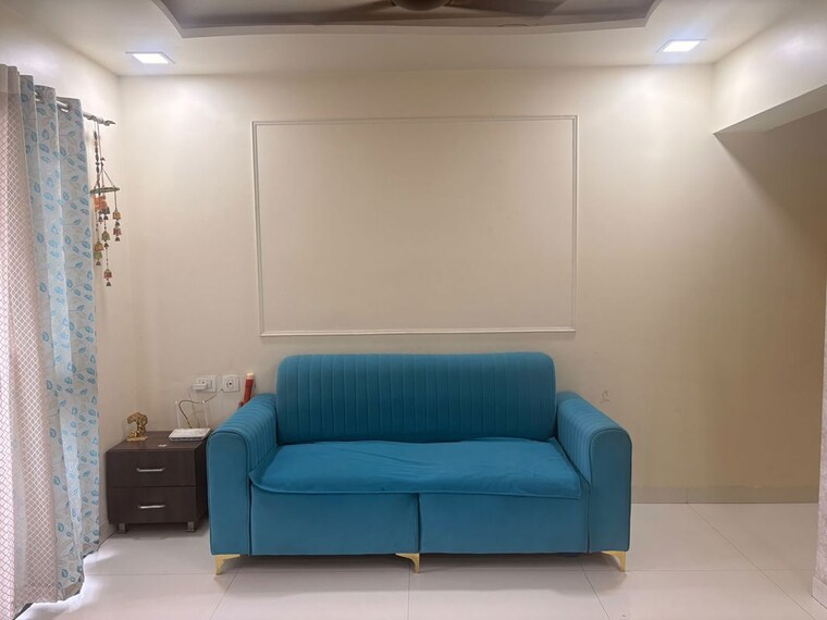 Living Room, aeropolis-phase-ii 2 Bedroom 950 Sq.Ft. Apartment In Dhanori Pune 10439722