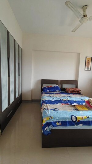 Bedroom in 2 BHK Apartment at Runwal Garden City, Balkum Pada – for Rent