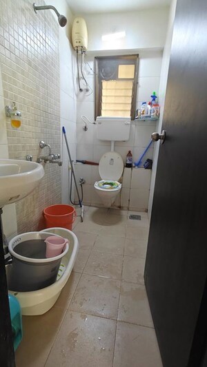Bathroom in 2 BHK Apartment at Runwal Garden City, Balkum Pada – for Rent