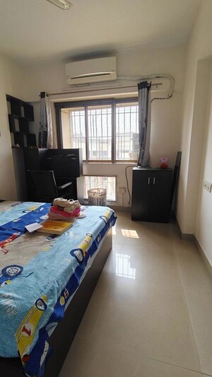 Bedroom in 2 BHK Apartment at Runwal Garden City, Balkum Pada – for Rent
