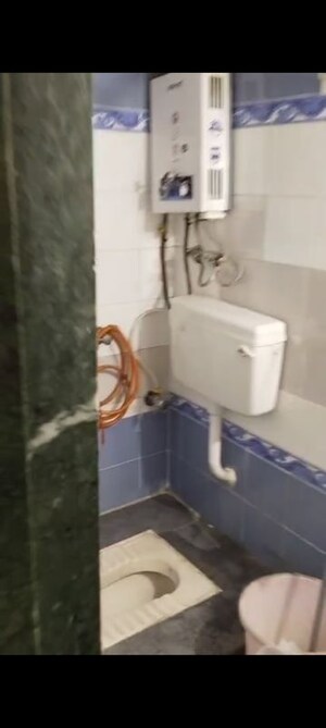 Bathroom in 1 BHK Apartment at Tilak Nagar – for Rent