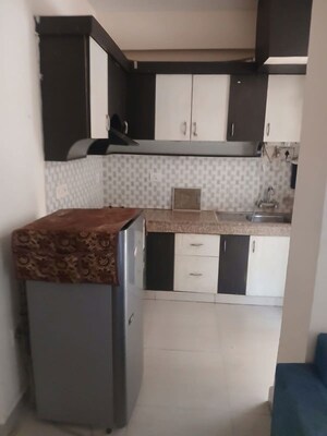 Kitchen in 2 BHK Apartment at Supertech Czar Suites, Omicron I Greater Noida – for Rent