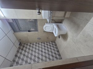 Bathroom in 2 BHK Apartment at Cosmos Habitat, Majiwada – for Rent