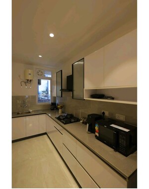 Kitchen in 3 BHK Builder Floor at MRG Crown, Sector 106 – for Sale