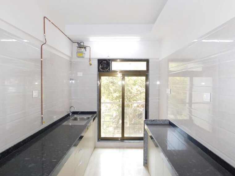 Kitchen, je-and-vee-om-trimurti 3 Bedroom 1150 Sq.Ft. Apartment In Malad East Mumbai 10440813