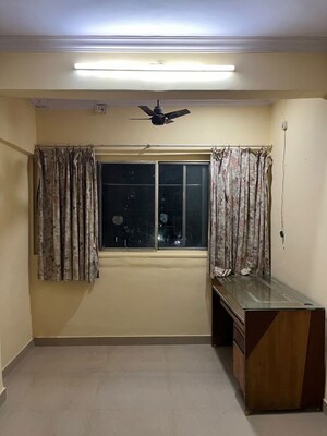 Living Room in 2 BHK Apartment at Om Siddhi CHS Malad, Malad West – for Rent