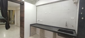 Kitchen in 1 BHK Apartment at Baba Solitaire, Vashi Sector 26 – for Sale