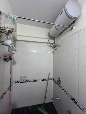 Bathroom in 2 BHK Apartment at K Raheja Heights, Malad East – for Rent