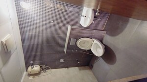 Bathroom in 1 BHK Apartment at Lodha Downtown, Dombivli East – for Rent