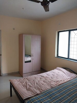 Bedroom in 2 BHK Apartment at Atharv Anand Apartments, Dhanori – for Rent