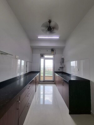 Kitchen in 2 BHK Apartment at Lodha Splendora, Ghodbunder Road – for Sale