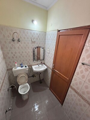 Bathroom in 2 BHK Apartment at Sector 12 Dwarka – for Rent