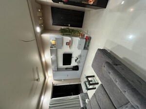 Living Room in 2 BHK Apartment at Mantra Grandstand Trinity, Kothrud – for Rent