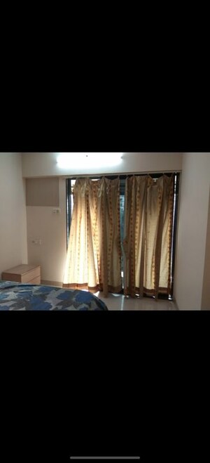 Bedroom in 2 BHK Apartment at Andheri CHS, Andheri West – for Rent
