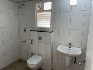 Bathroom in 2 BHK Apartment at Godrej Aqua, International Airport Road – for Rent