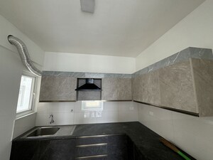 Kitchen in 2 BHK Apartment at Godrej Aqua, International Airport Road – for Rent