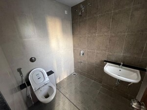 Bathroom in 3 BHK Apartment at Mantra Mesmer, Keshav Nagar – for Rent